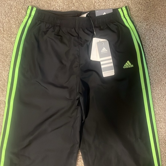 Adidas Women’s Black Track Pants with Neon Green Stripes - Picture 3 of 8